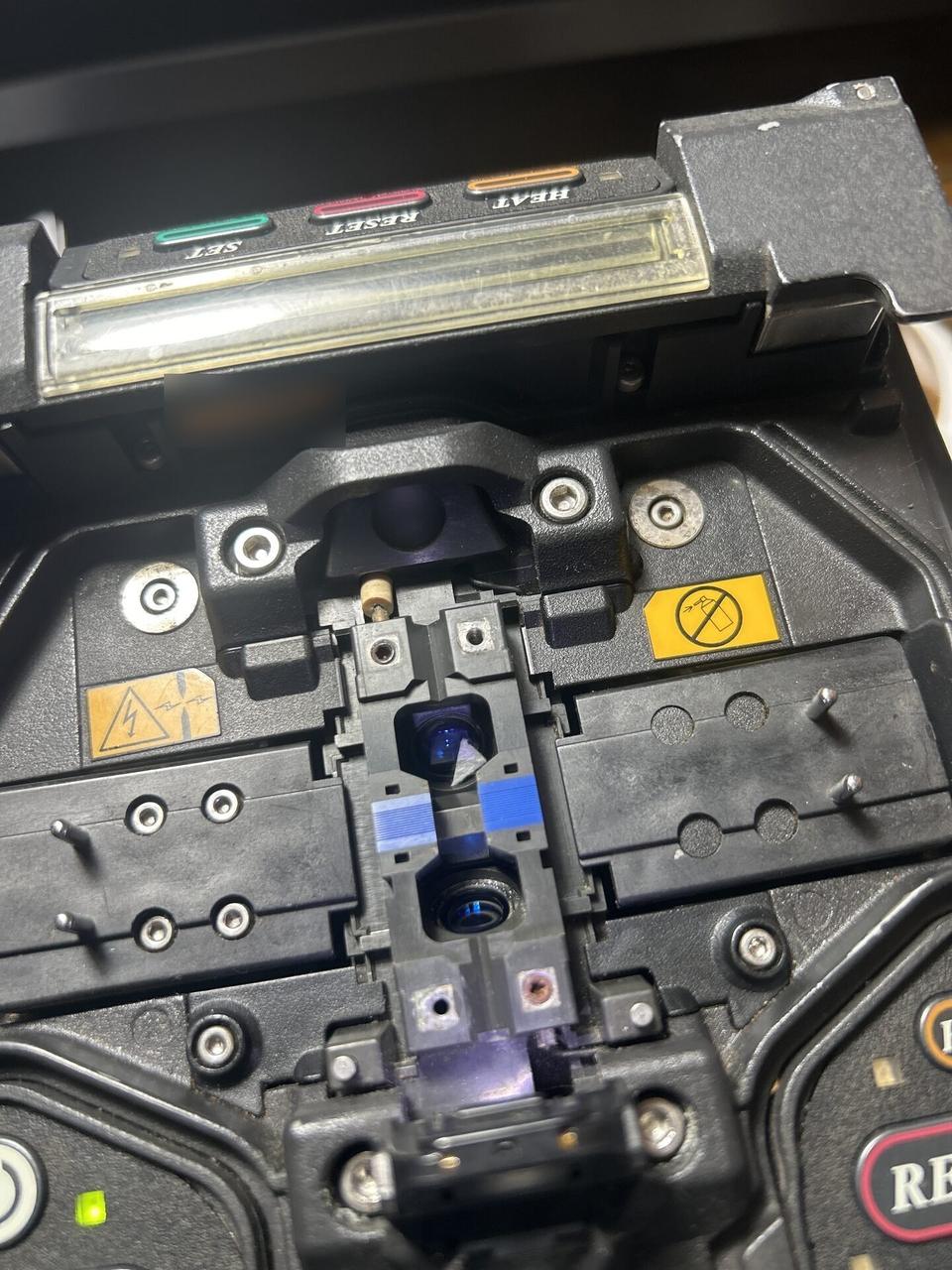 Service documentation showing fiber splicing and cable preparation detail for low-voltage network support