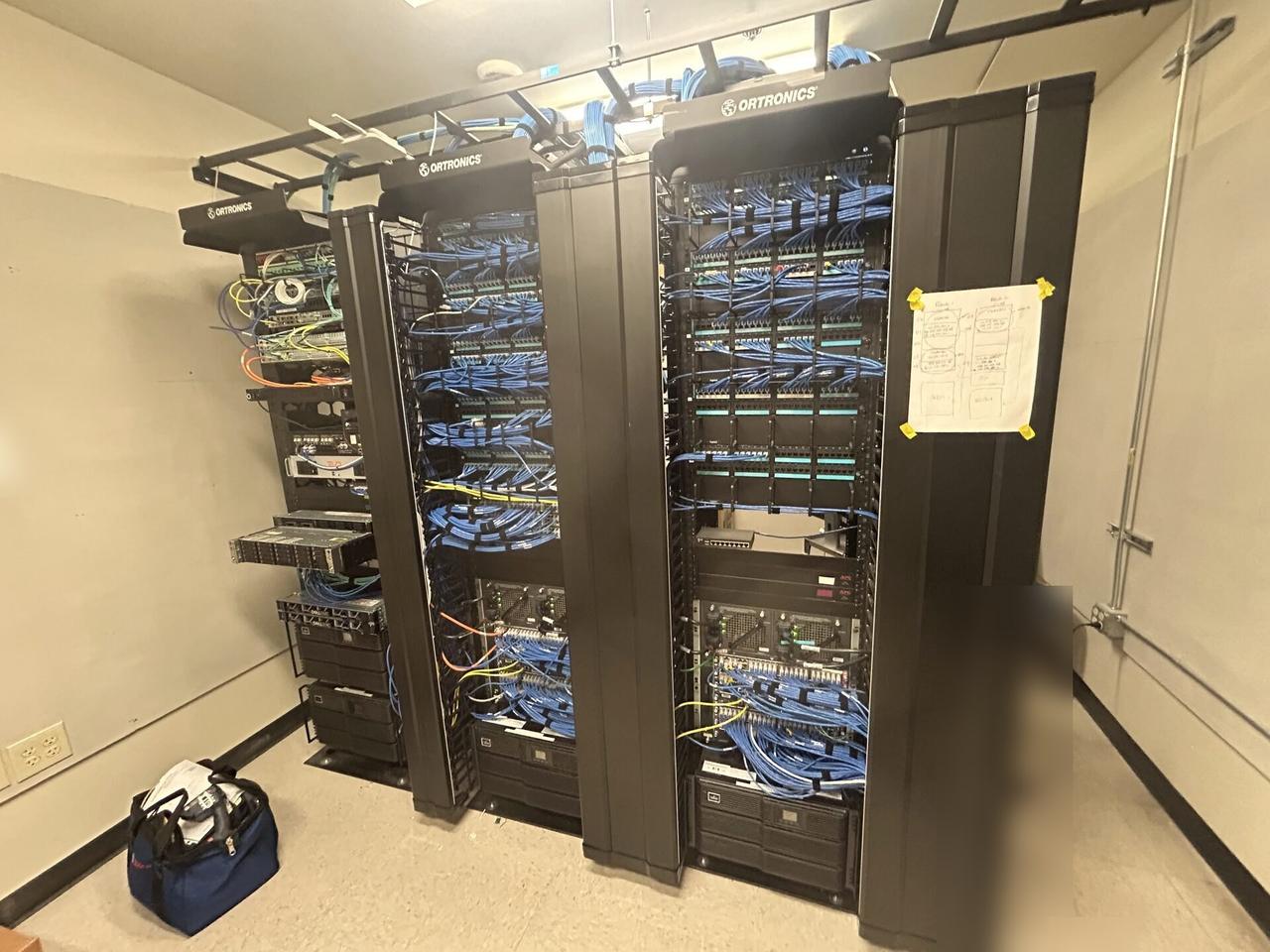 Onsite service photo showing structured cabling inside a network rack inside the equipment cabinet