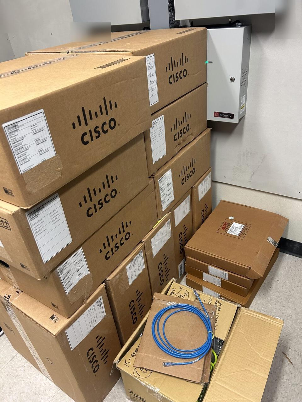Smart technology service detail: rack-mounted network hardware during service inside the equipment cabinet