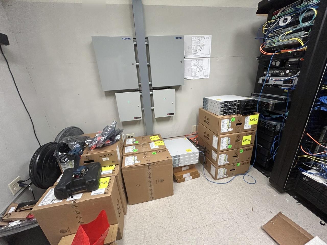 Network rack and patch panel cabling during network hardware support documented for a smart technology service call