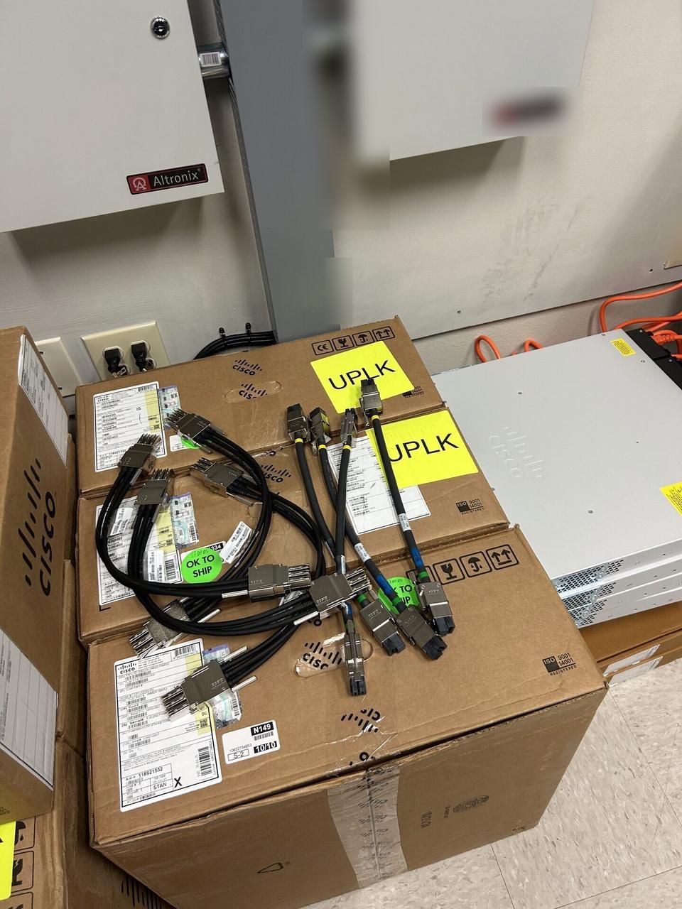 Structured cabling inside a network rack with rack cabling organized during an Alrty onsite service visit