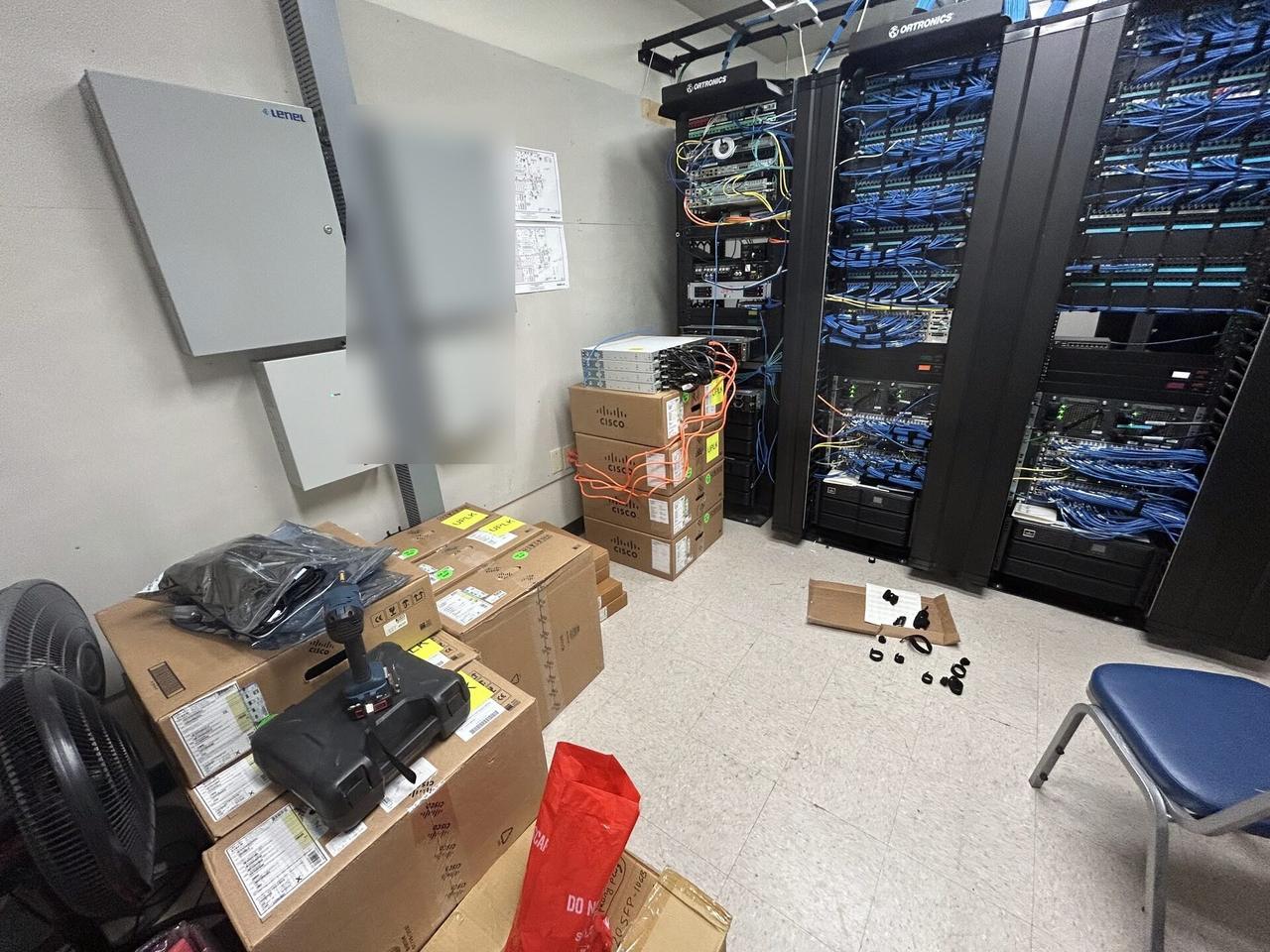 Alrty portfolio view of equipment cabinet cabling and switch handoff before final connectivity checks