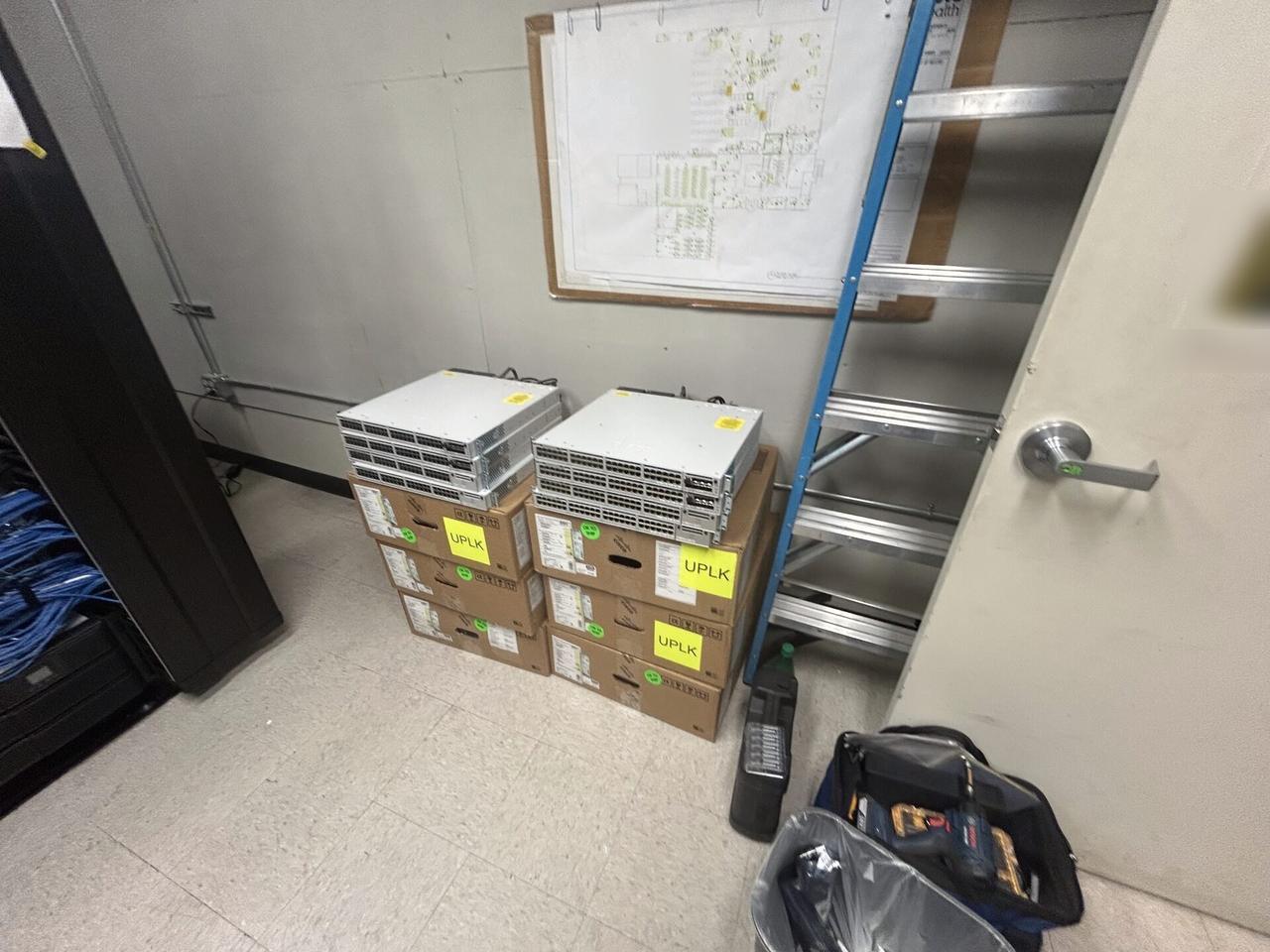 Onsite service photo showing structured cabling inside a network rack with rack cabling organized