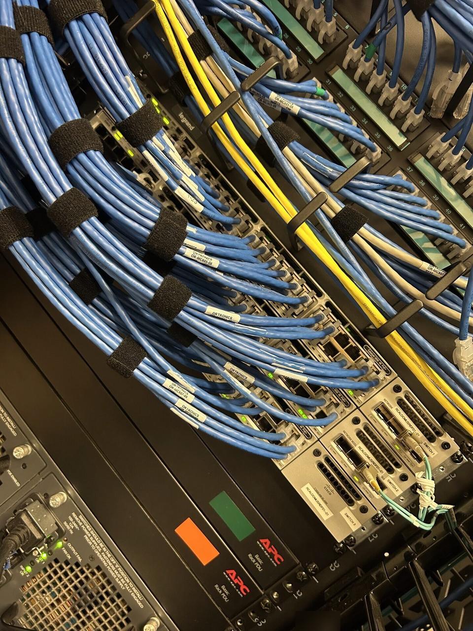 Service documentation showing equipment cabinet cabling and switch handoff inside the equipment cabinet