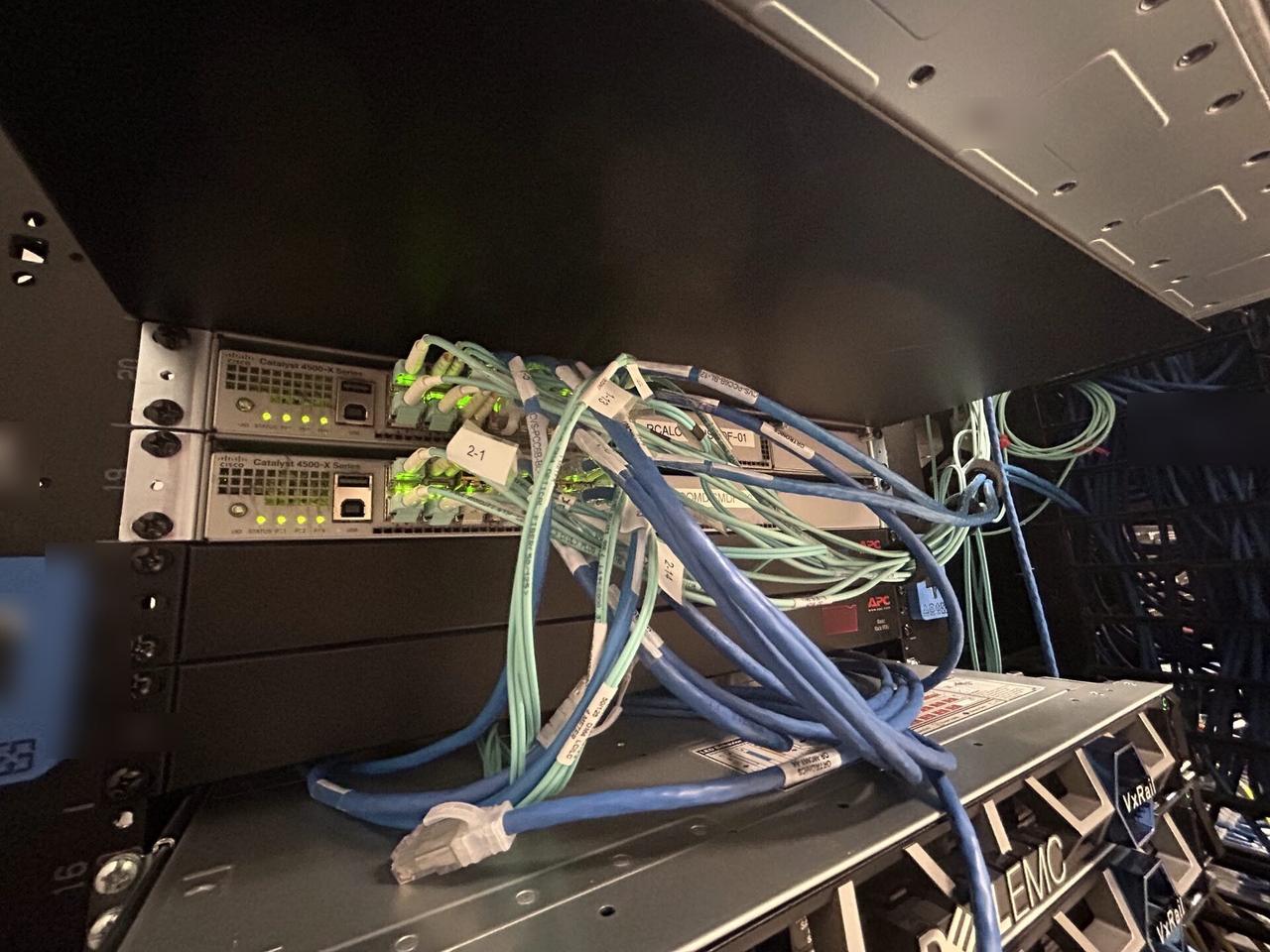 Network rack and patch panel cabling during network hardware support documented for a smart technology service call