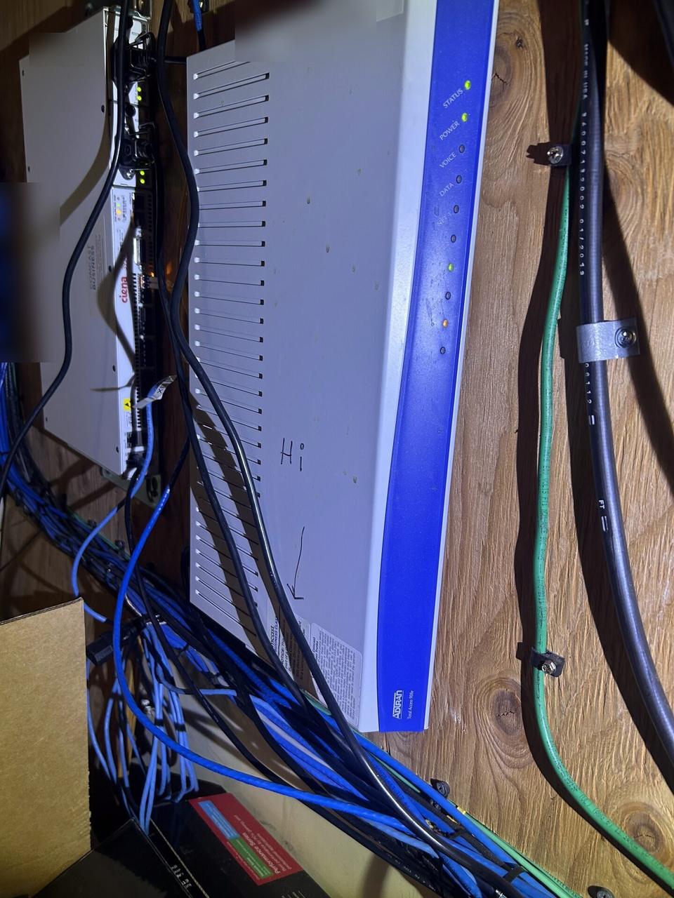 Structured cabling inside a network rack at the server-room handoff point during an Alrty onsite service visit