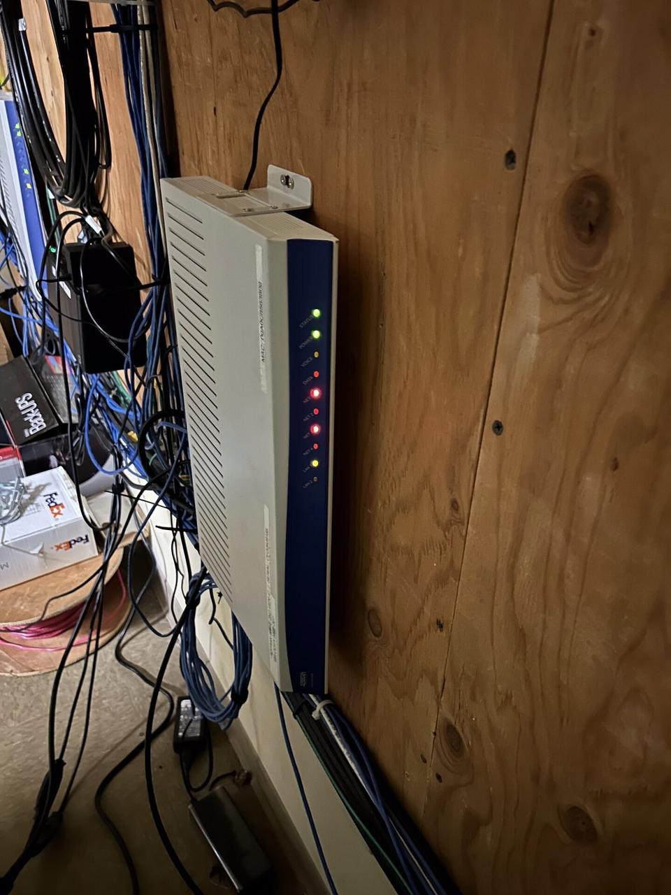 Alrty portfolio view of rack or server-room network equipment with private labels omitted