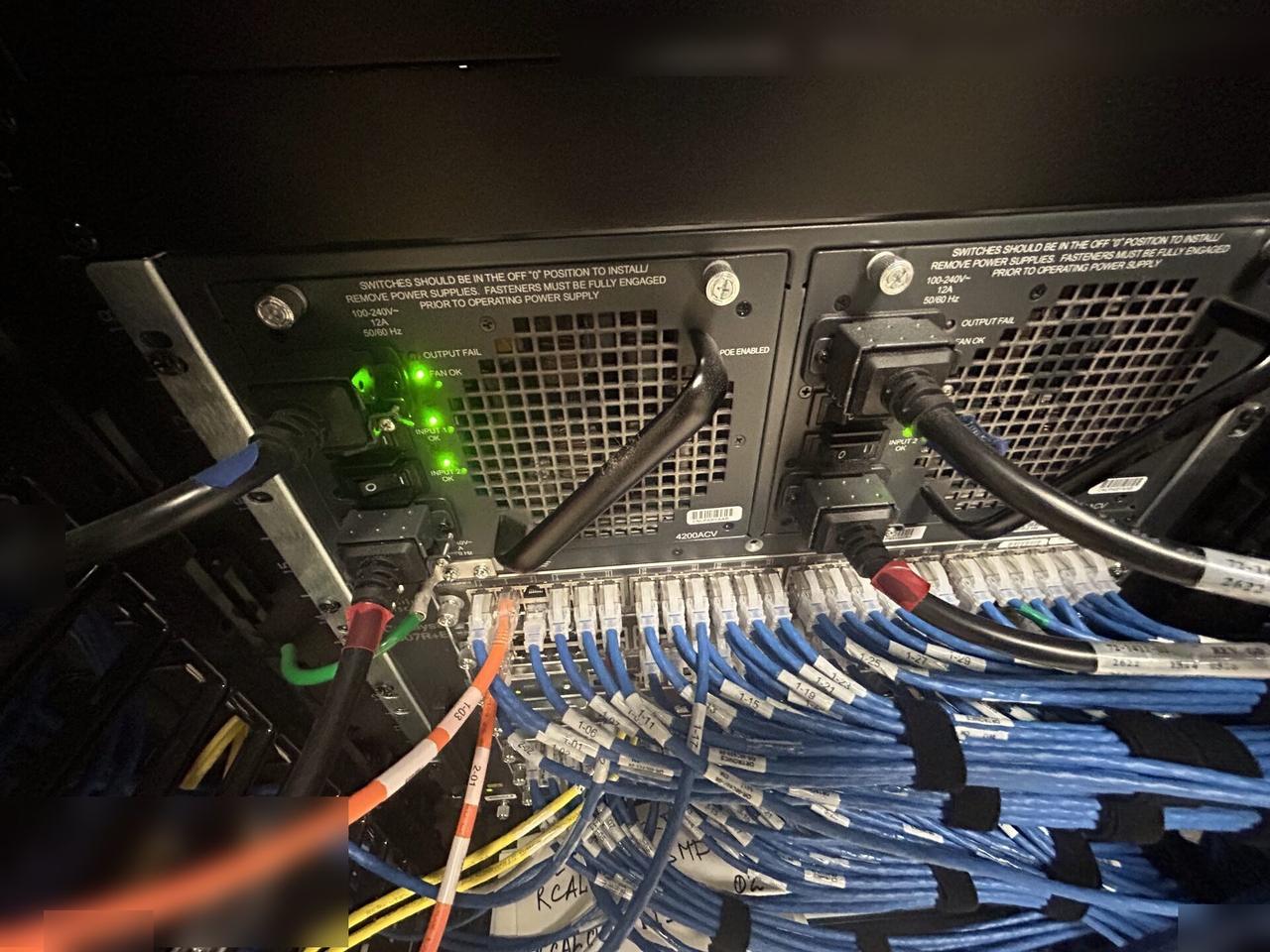 Service documentation showing equipment cabinet cabling and switch handoff inside the equipment cabinet