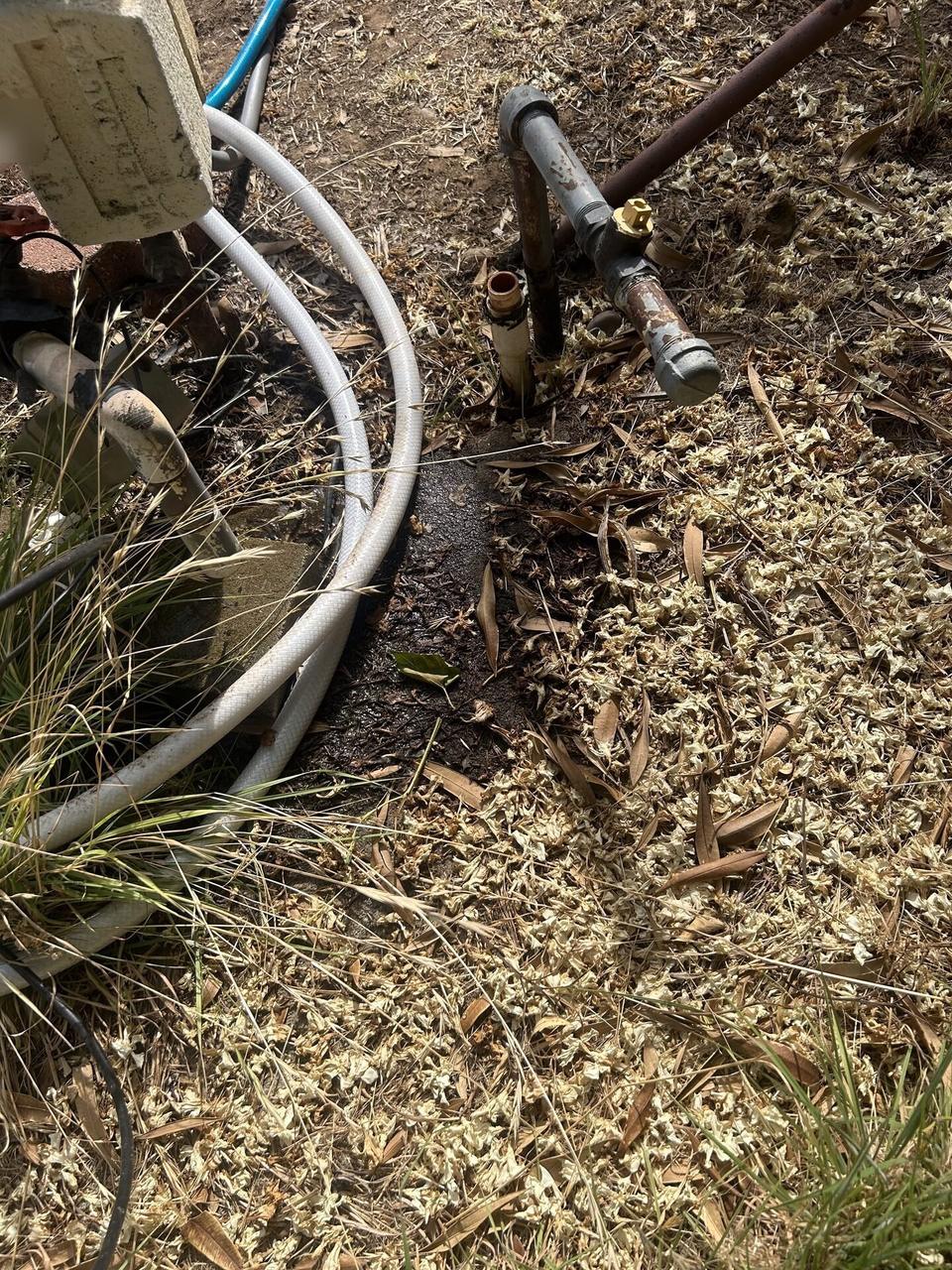 Alrty field photo with fiber testing or optical signal verification at the service handoff point
