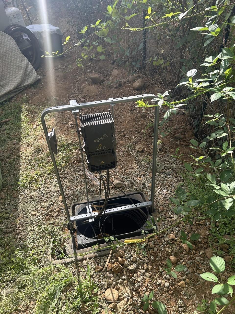 Alrty portfolio view of outdoor fiber distribution unit for customer drops with tools or ports visible