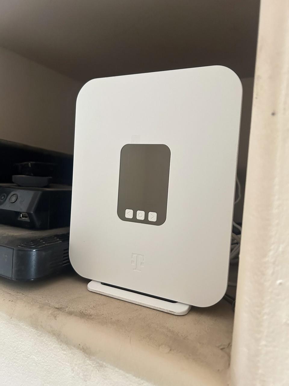 Smart technology service detail: wireless access point and router setup detail with cable routing visible