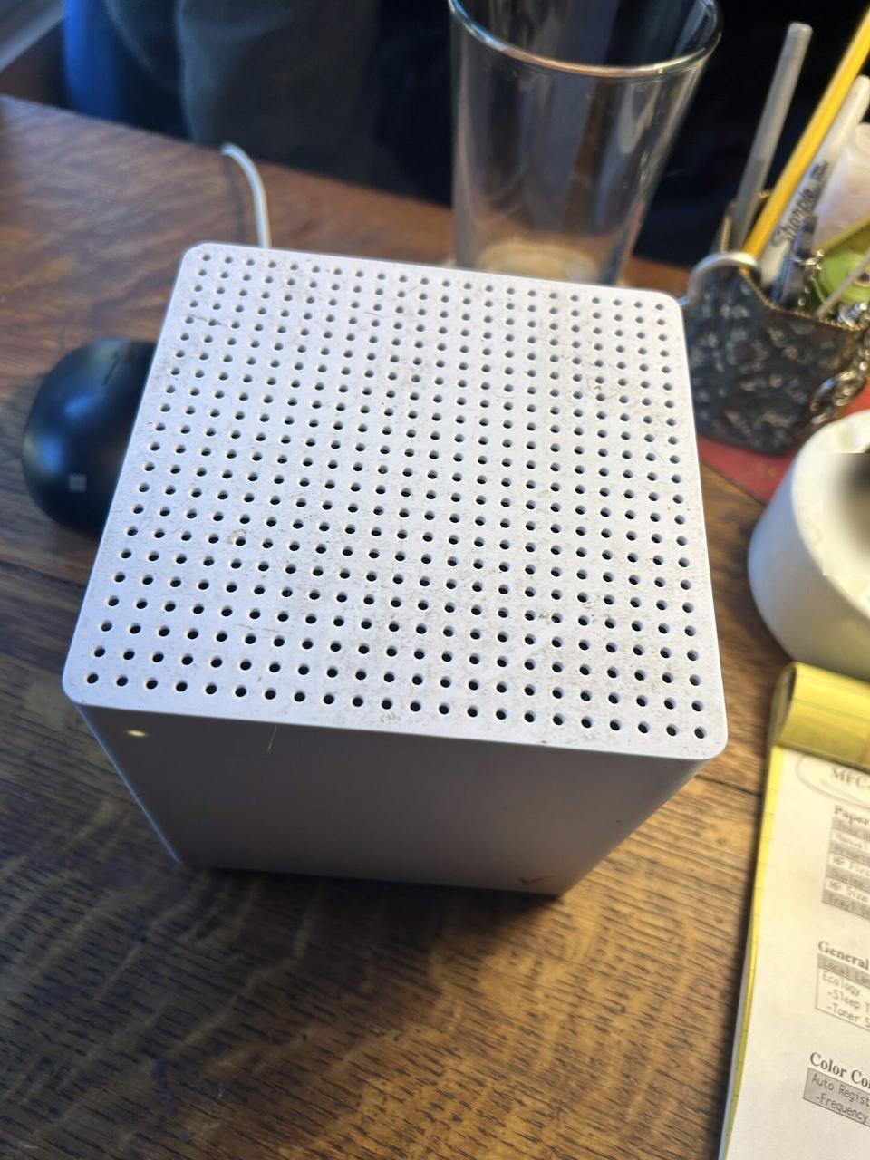Alrty portfolio view of onsite router or access point service work with service ports visible