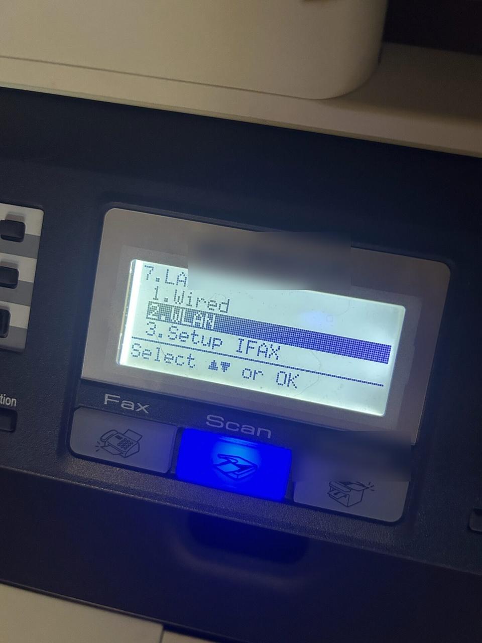 Public-safe portfolio image of business printer setup at the service location before final print testing