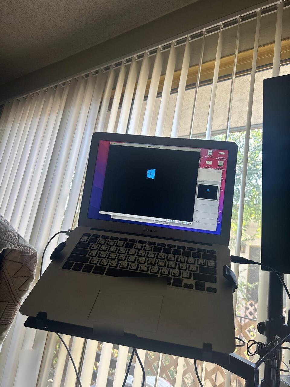 Onsite service photo showing workstation monitor screen used for setup validation with setup context visible