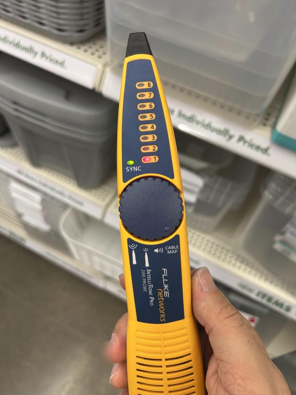 Service documentation showing Fluke tester running an audible continuity check