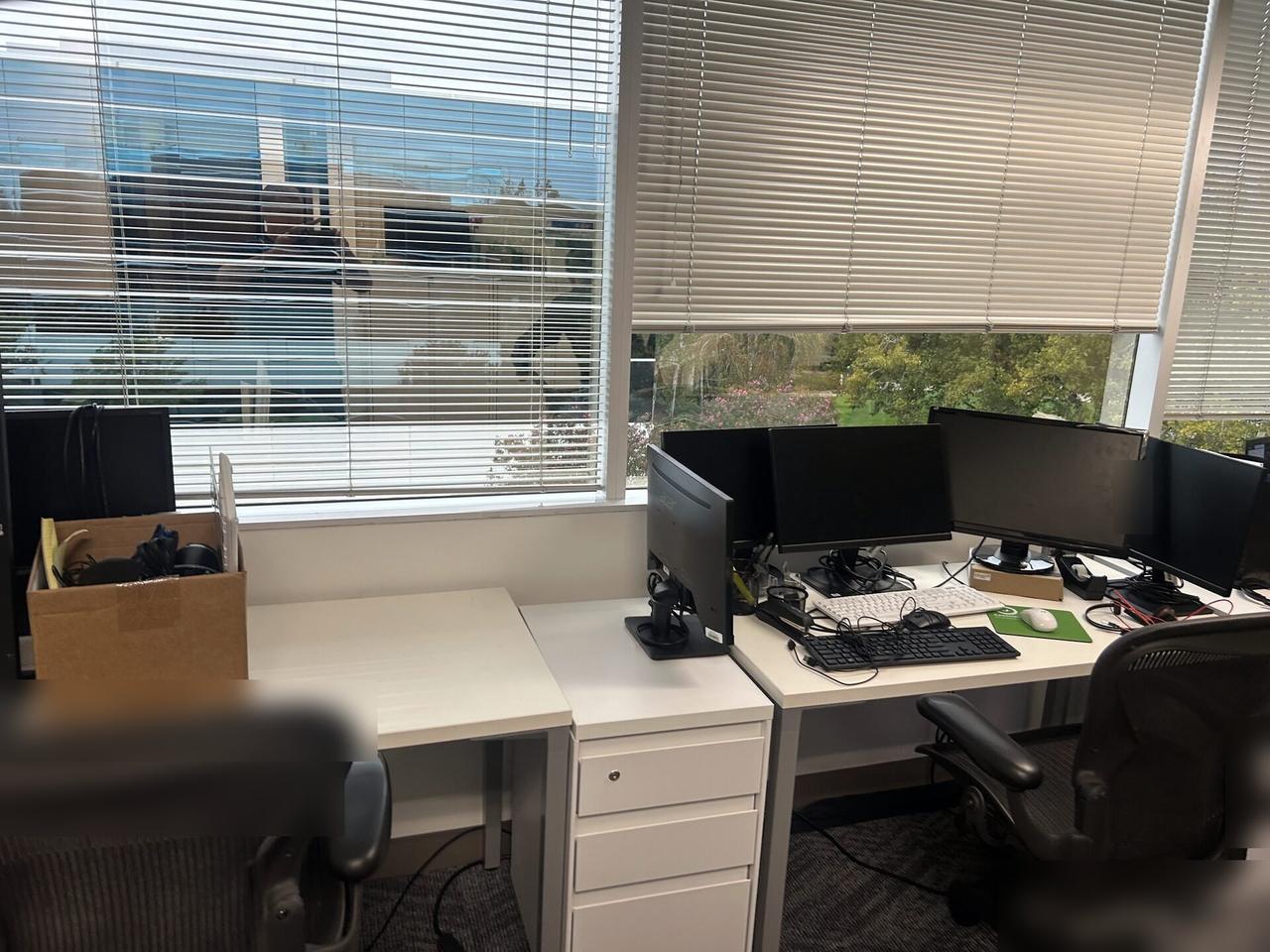 Public-safe portfolio image of desk-side workstation setup during onsite service at a business workstation