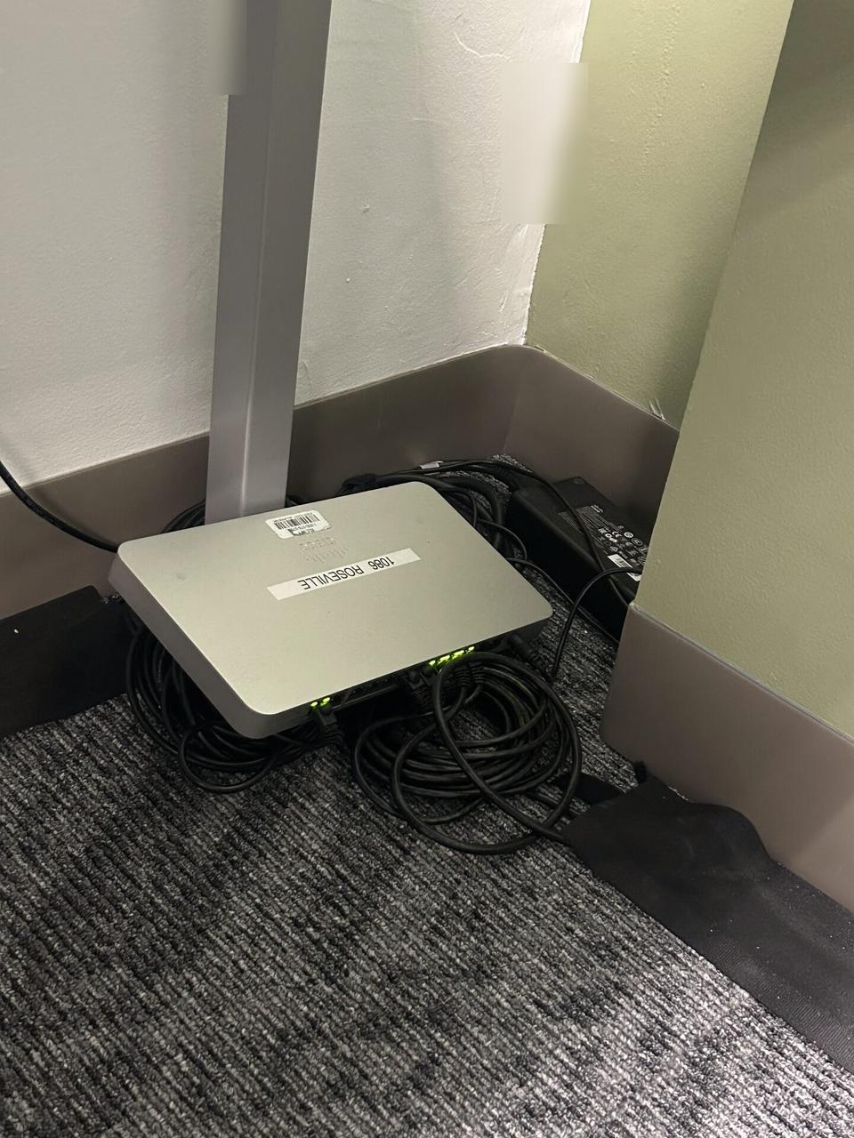 Wireless access point and router setup detail at the device handoff point documented for a smart technology service call