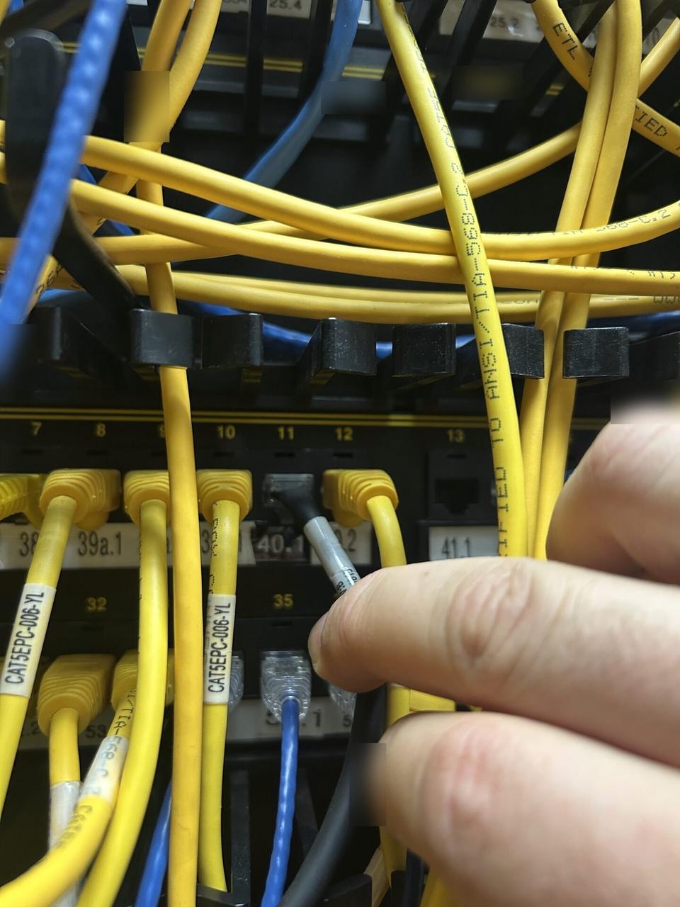 Smart technology service detail: low-voltage hardware and device cabling at the device handoff point