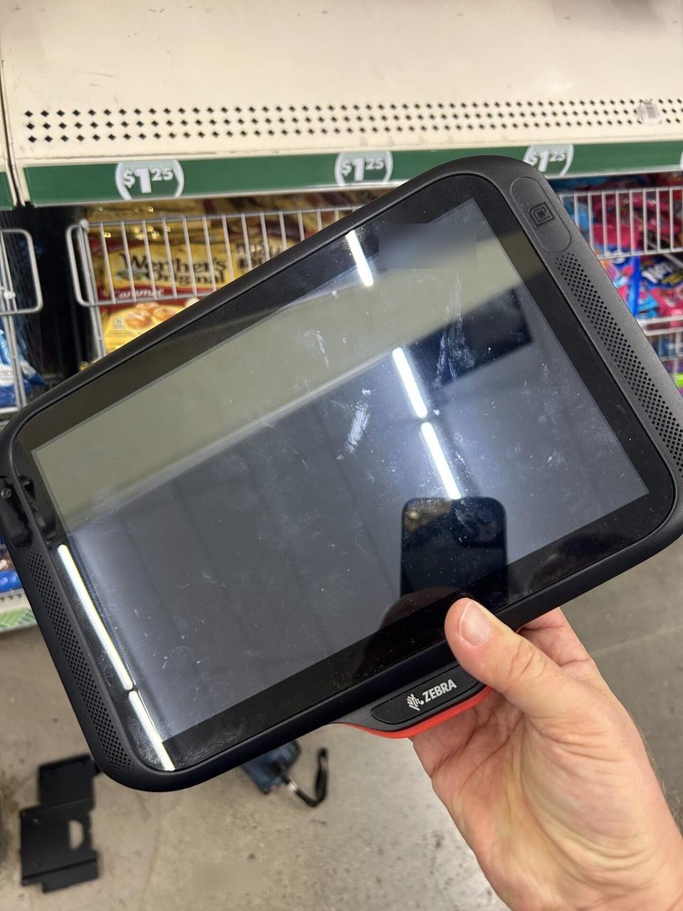 Public-safe portfolio image of retail price checker and POS lookup station