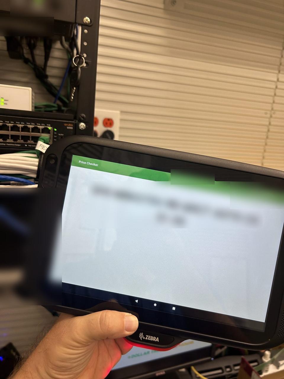Alrty field photo with retail price checker and POS lookup station
