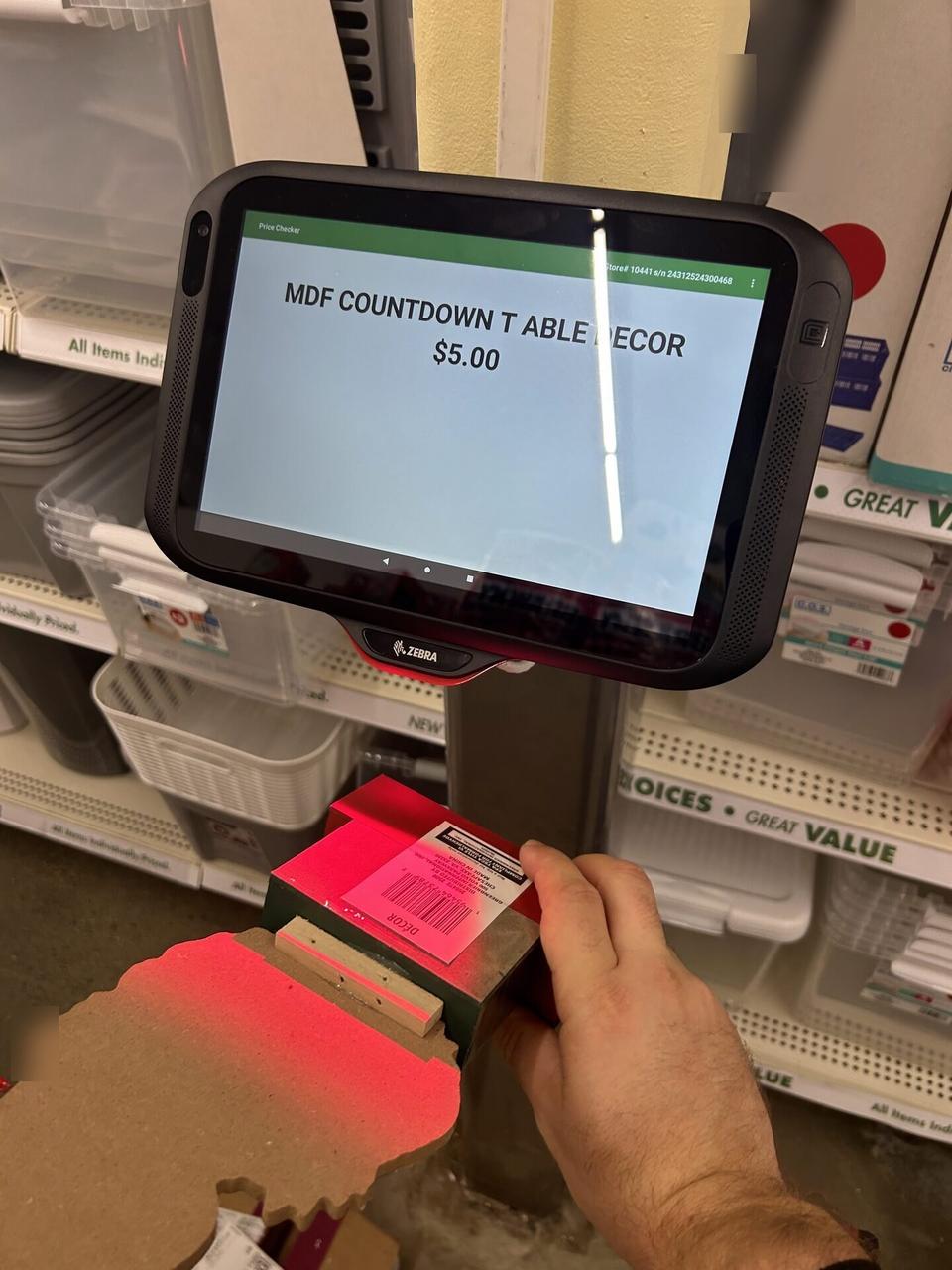 Retail price checker and POS lookup station during an Alrty onsite service visit