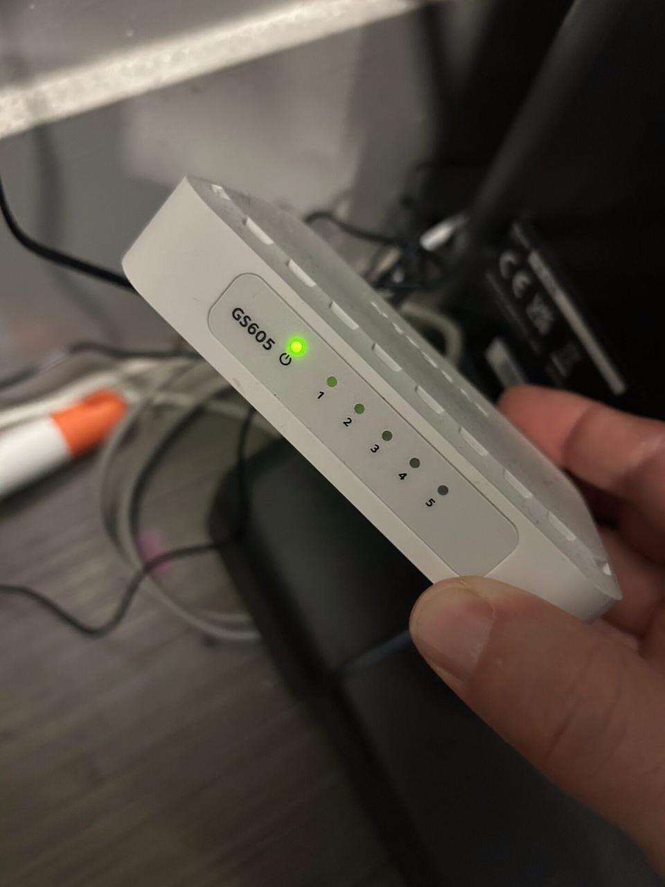 Real low-voltage network hardware and cable handoff photo for backup internet planning