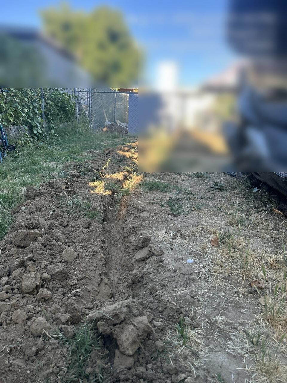 Onsite service photo showing fiber cable trench and underground service route