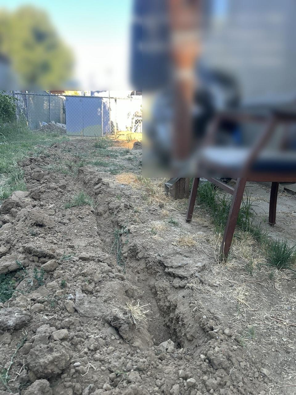 Public-safe portfolio image of fiber cable trench and underground service route