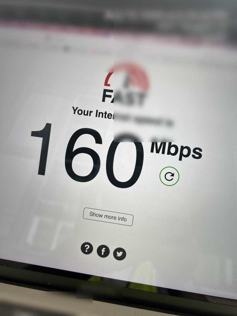 Onsite service photo showing connectivity speed-test screen