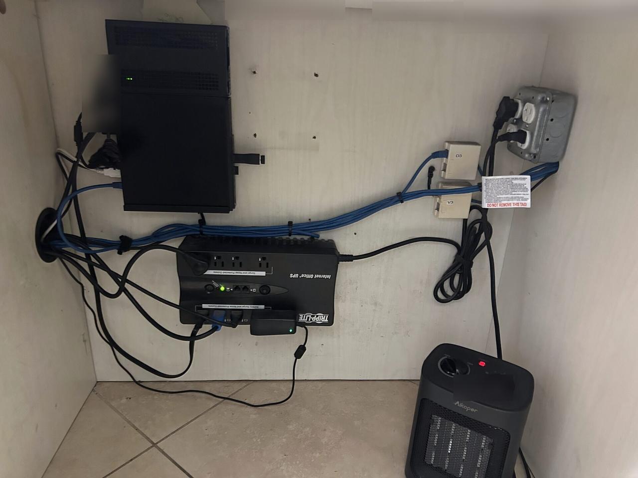 Onsite service photo showing payment terminal and POS equipment handoff with private labels omitted