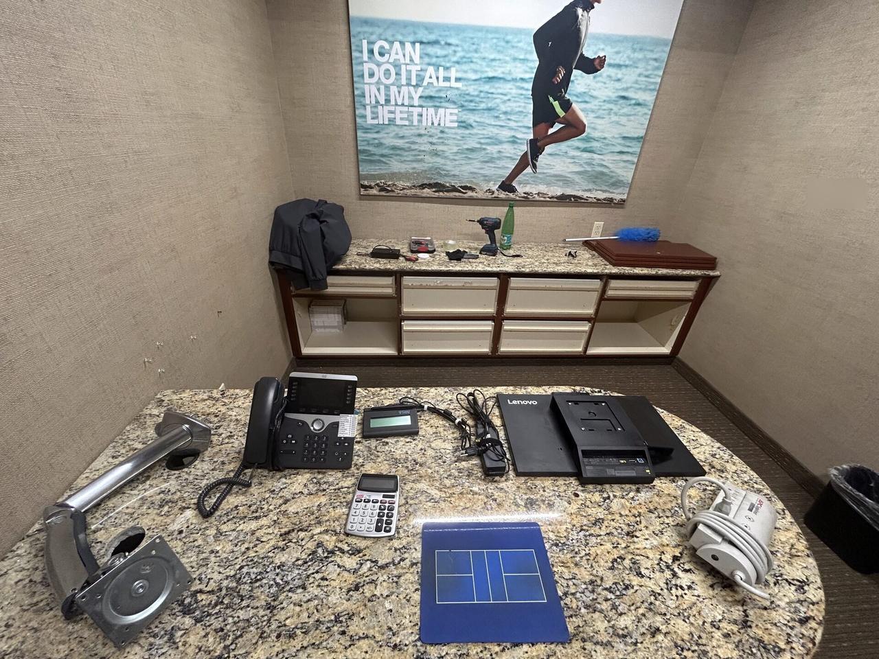Smart technology service detail: office workstation setup with monitors during workstation validation