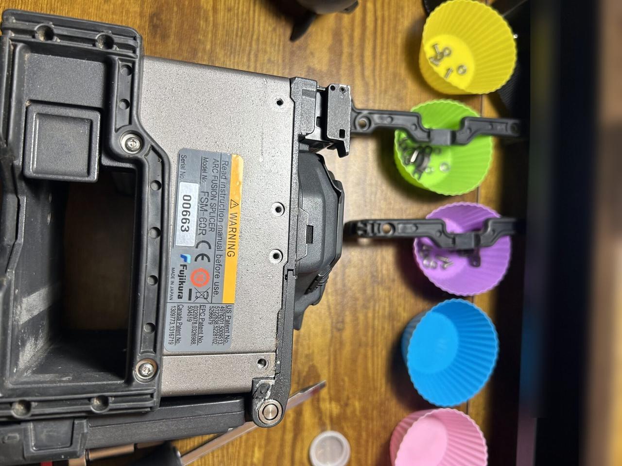 Service documentation showing fiber fusion splicer service work