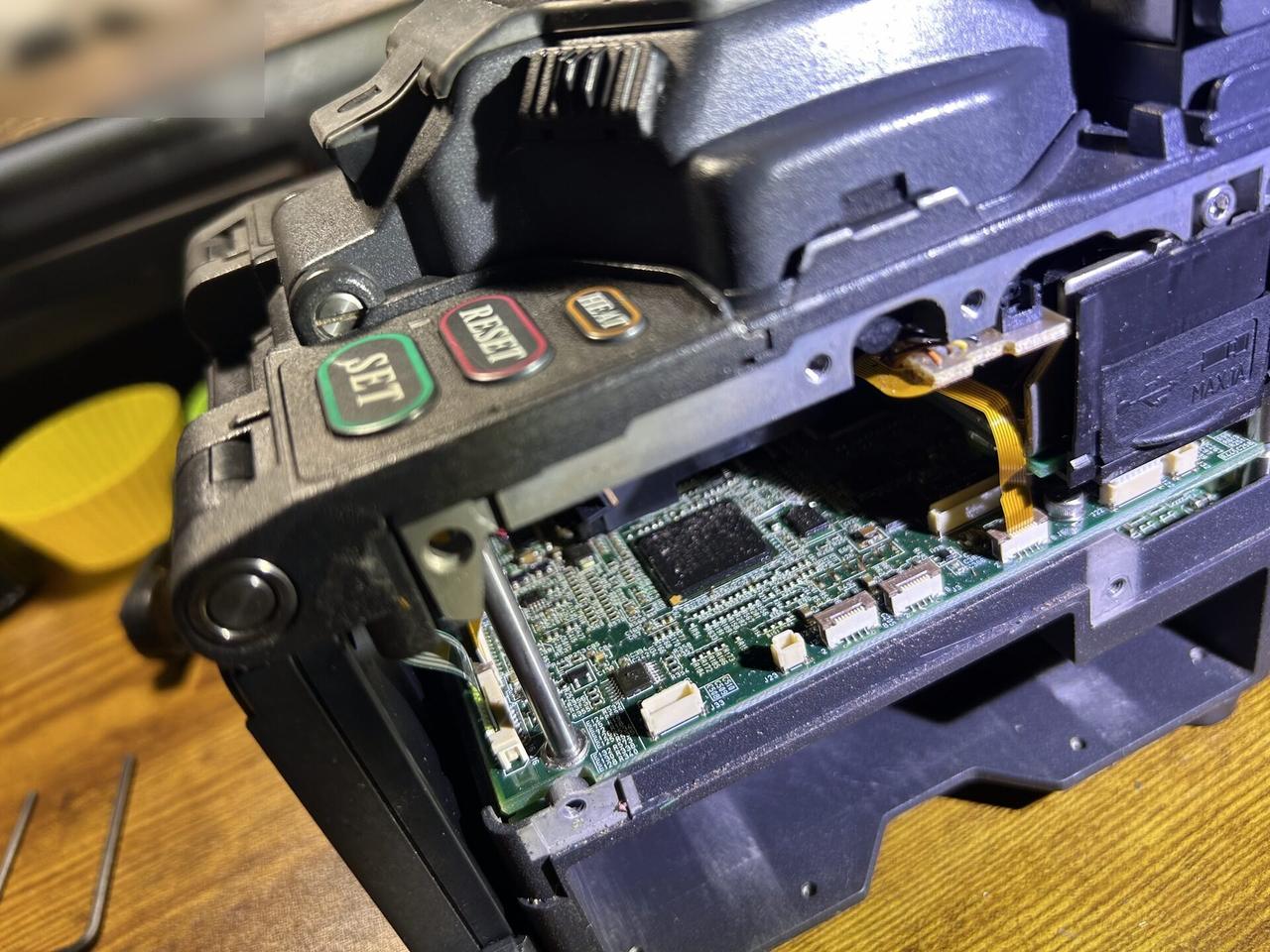 Fiber fusion splicer service work during an Alrty onsite service visit