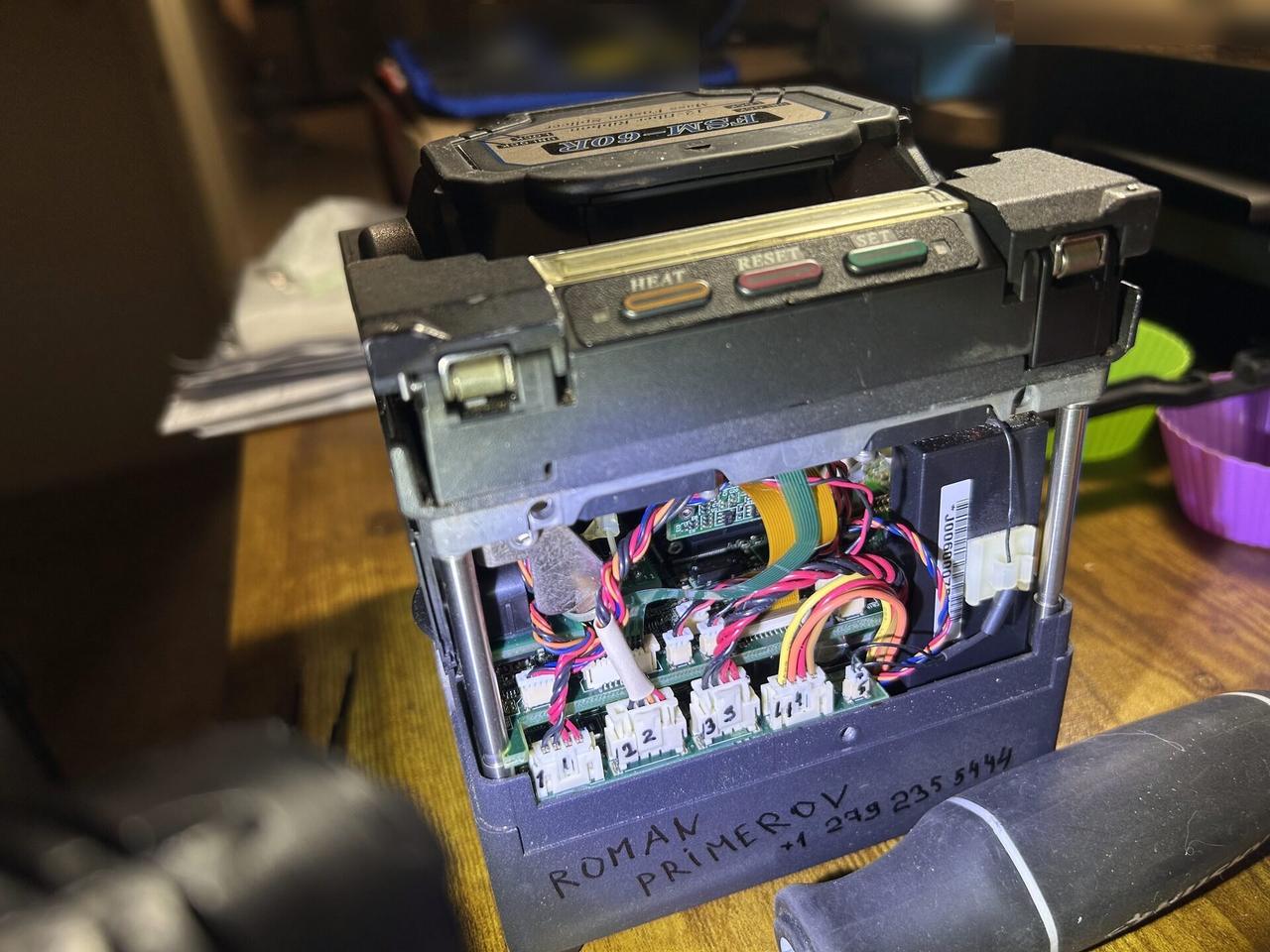 Public-safe portfolio image of fiber fusion splicer service work