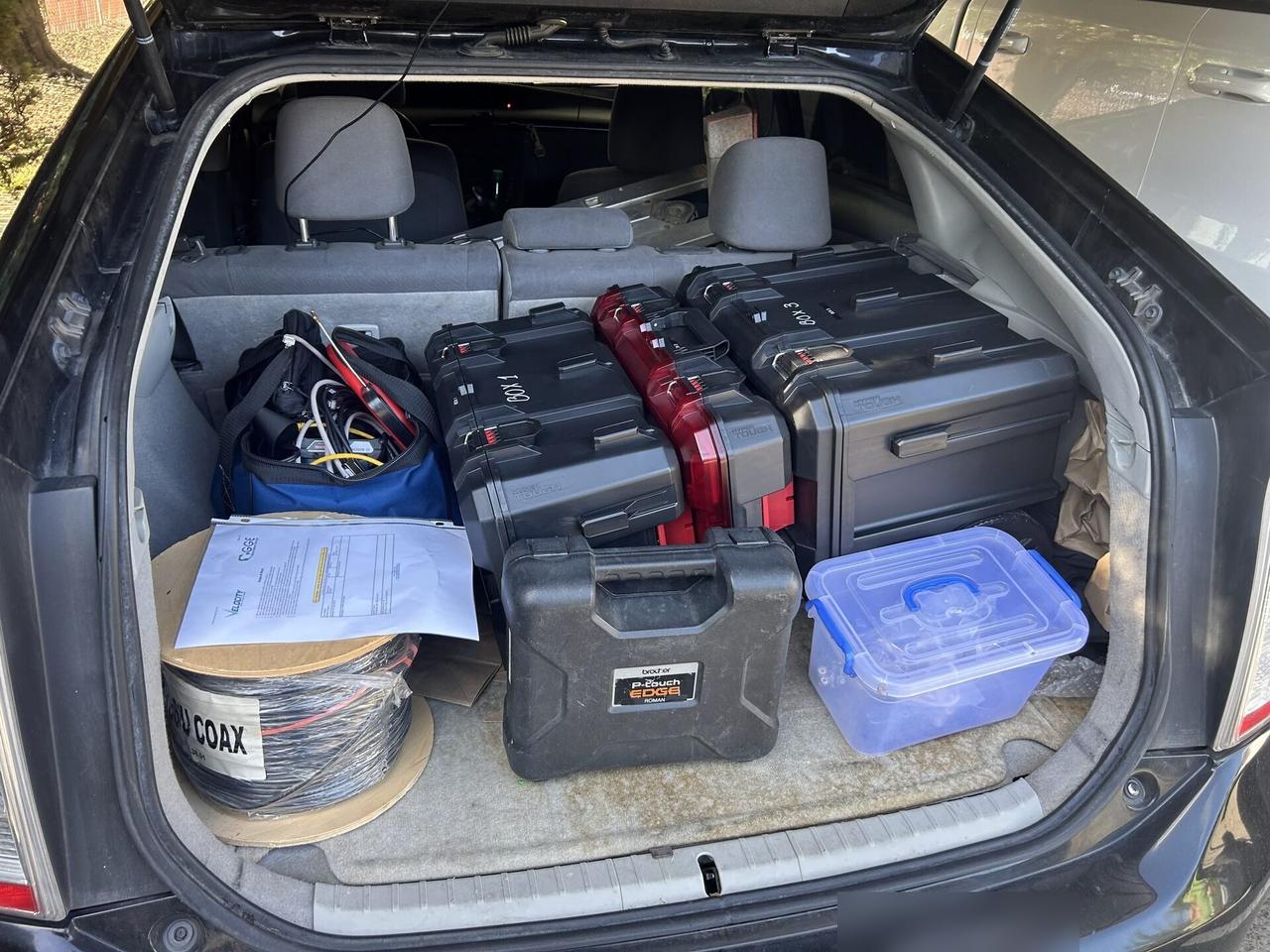 Onsite service photo showing field-service tool kit used for cable or device work before field troubleshooting