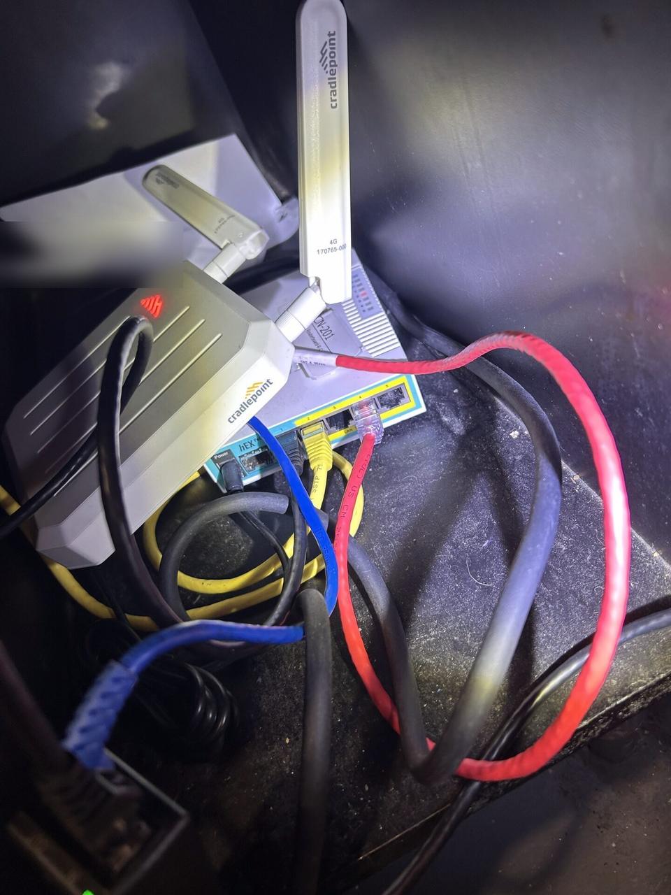 Network device cabling and connectivity check with private labels omitted documented for a smart technology service call