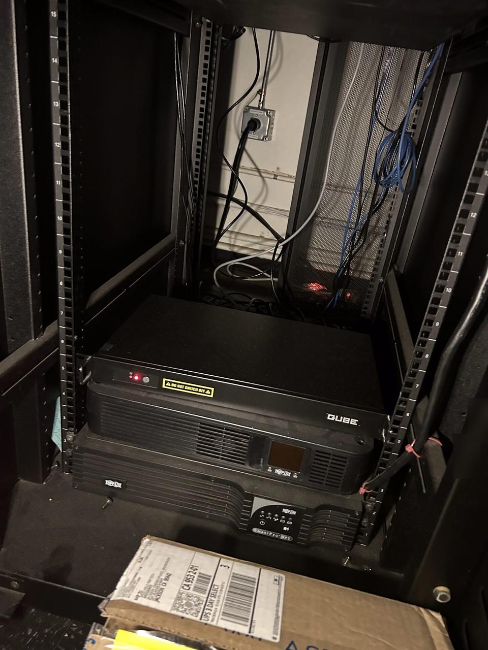 Alrty portfolio view of structured cabling inside a network rack before final connectivity checks