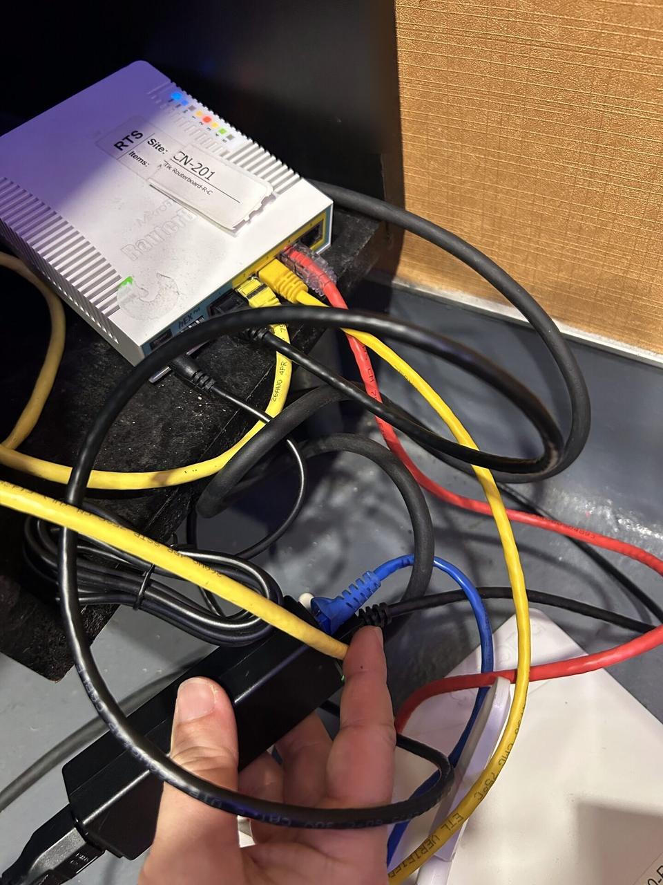 Alrty portfolio view of network connectivity hardware at the service location before final network testing