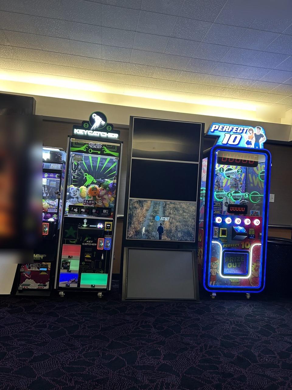 Service documentation showing multi-TV theater poster display assembled from multiple screens