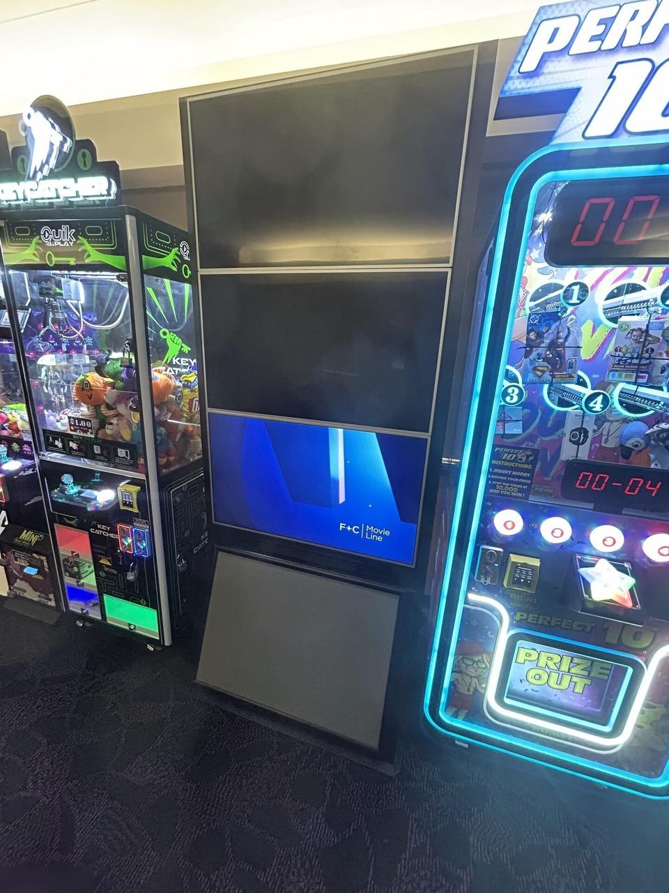 Smart technology service detail: multi-TV theater poster display assembled from multiple screens