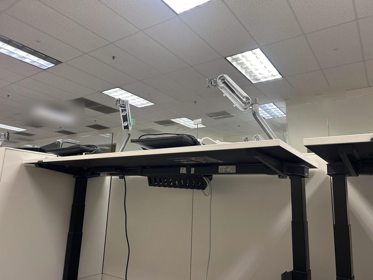 Smart technology service detail: desk-side workstation setup during onsite service before final user handoff