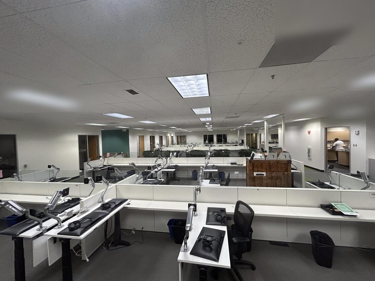 Onsite service photo showing business workstation hardware and monitor cabling during workstation validation