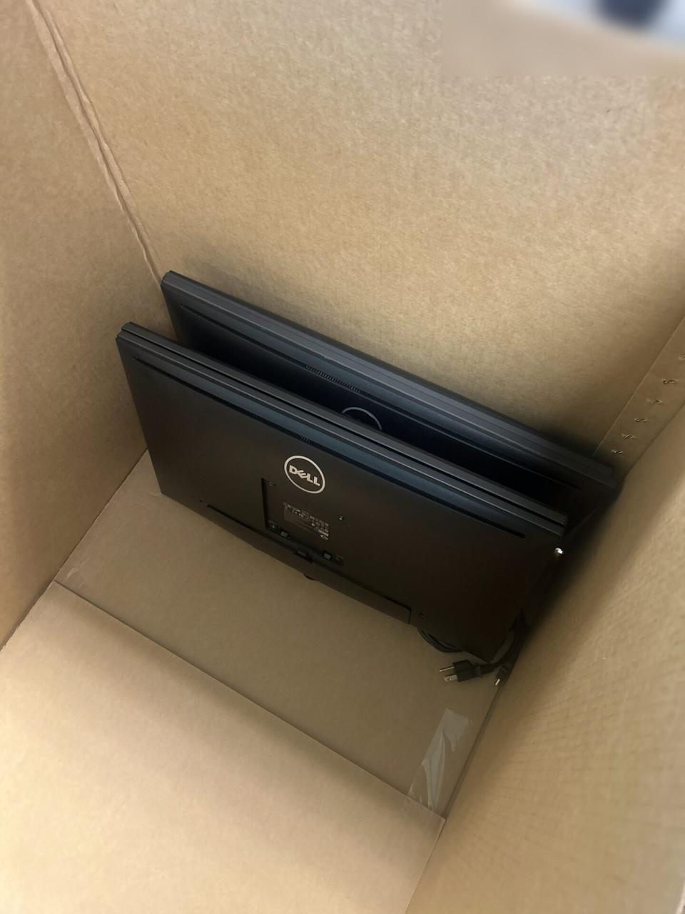 Office workstation monitors and desktop equipment for office technology support documented for a smart technology service call