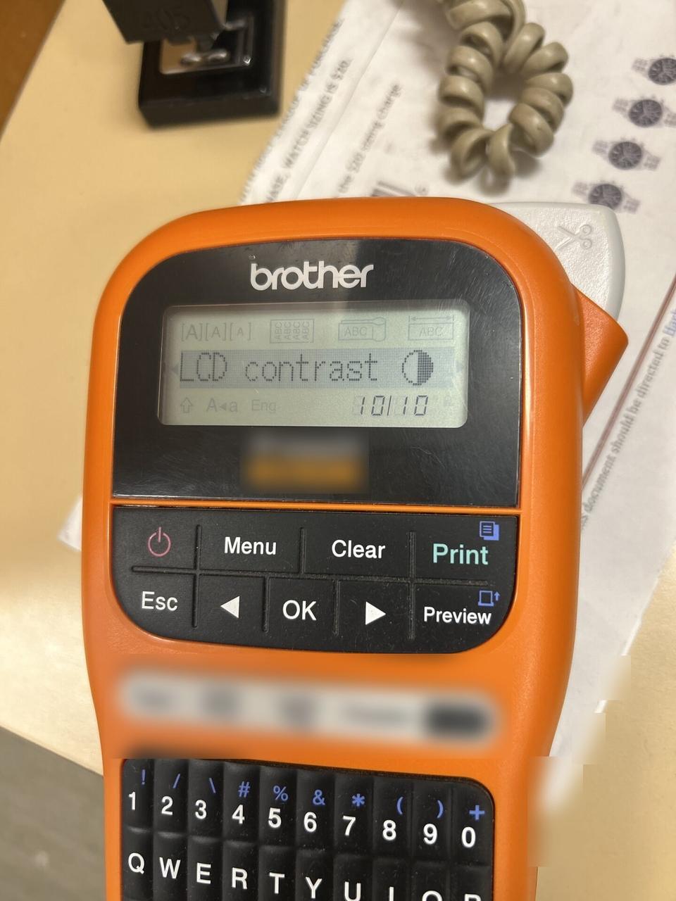 Onsite service photo showing label printer used for cable and device labeling