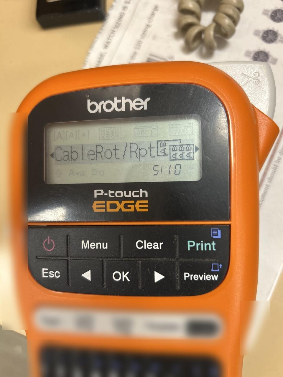 Service documentation showing label printer used for cable and device labeling