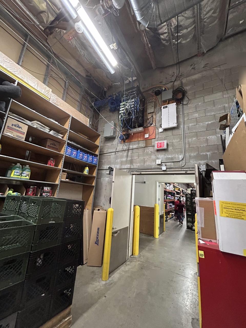 Retail worksite aisle during onsite field-service work during an Alrty onsite service visit