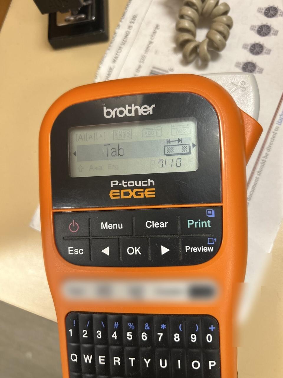 Smart technology service detail: label printer used for cable and device labeling