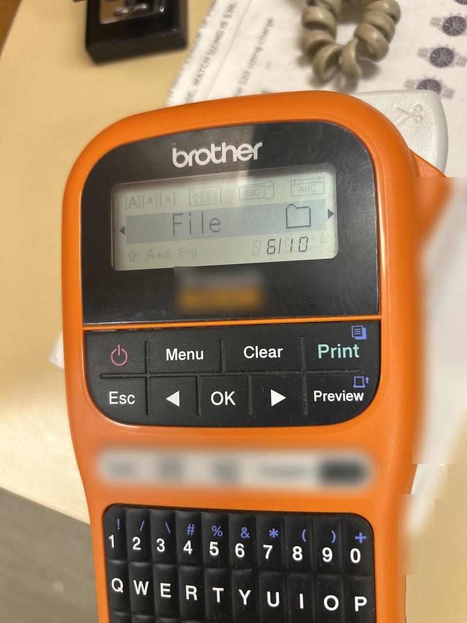 Public-safe portfolio image of label printer used for cable and device labeling