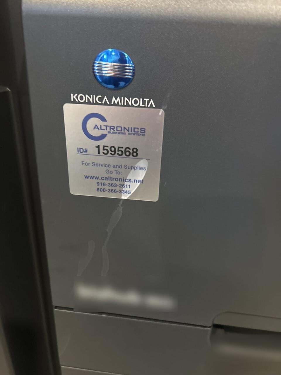 Onsite service photo showing office printer hardware and device support at the service location