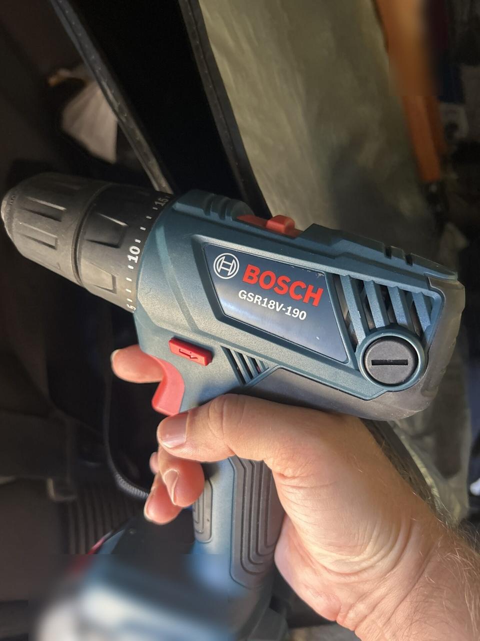 Service documentation showing Bosch drill for onsite installation work